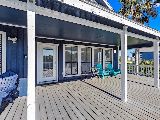 wooden deck featuring a porch