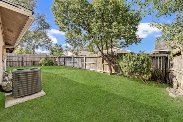 view of yard featuring central AC unit