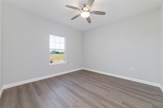 empty room featuring ceiling fan and wood-type flooring