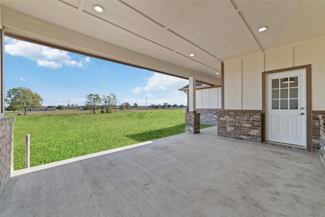 view of patio / terrace with a rural view