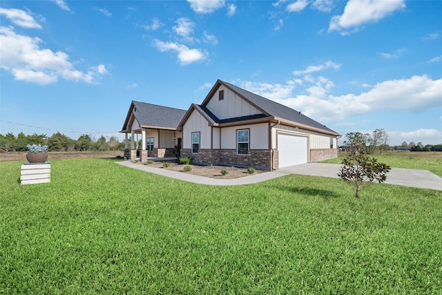 view of front of house with a garage and a front yard