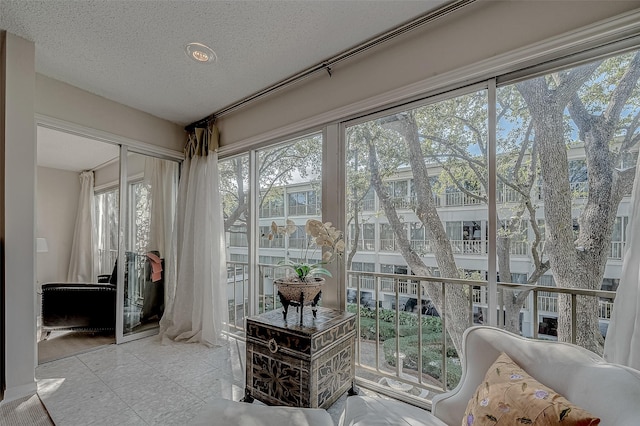 sunroom with plenty of natural light