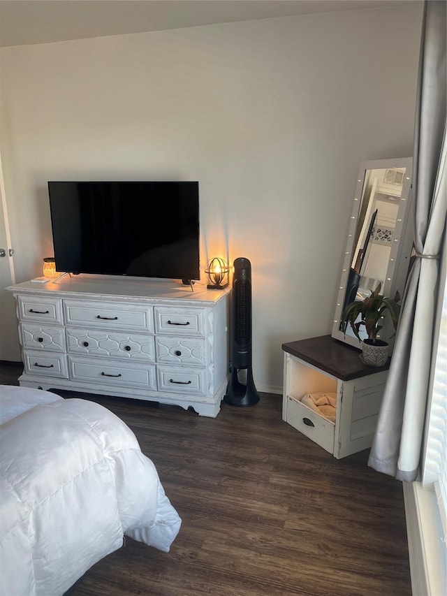 bedroom featuring dark hardwood / wood-style floors