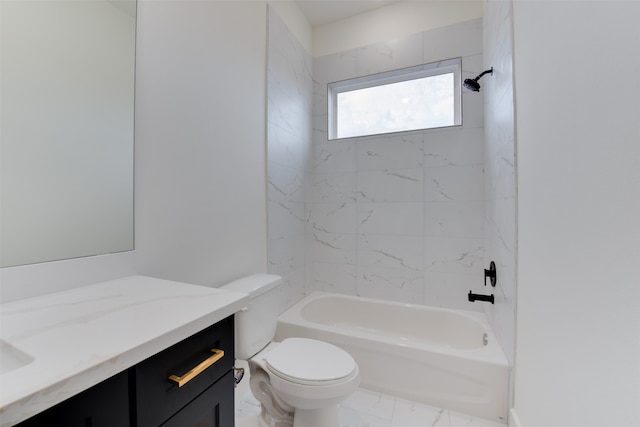 full bathroom featuring vanity, tiled shower / bath combo, and toilet