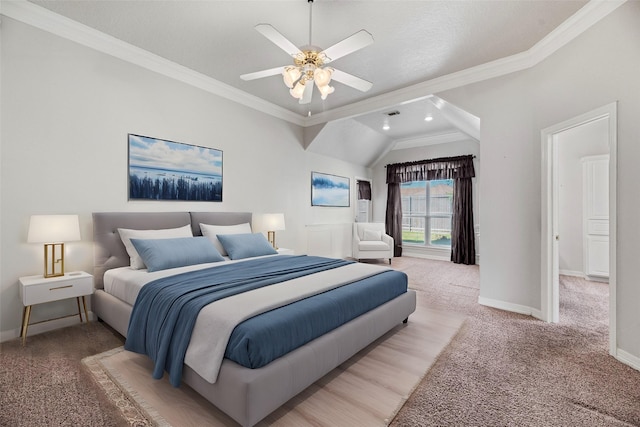 bedroom with lofted ceiling, carpet floors, ceiling fan, and ornamental molding