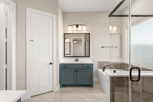 bathroom featuring vanity, separate shower and tub, and tile patterned flooring