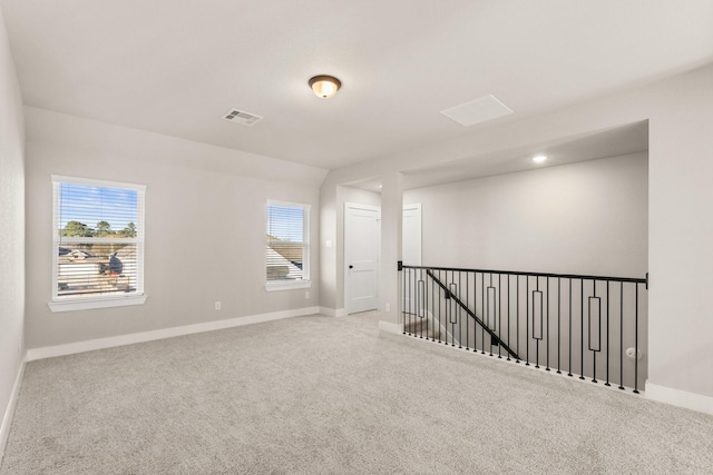 view of carpeted spare room