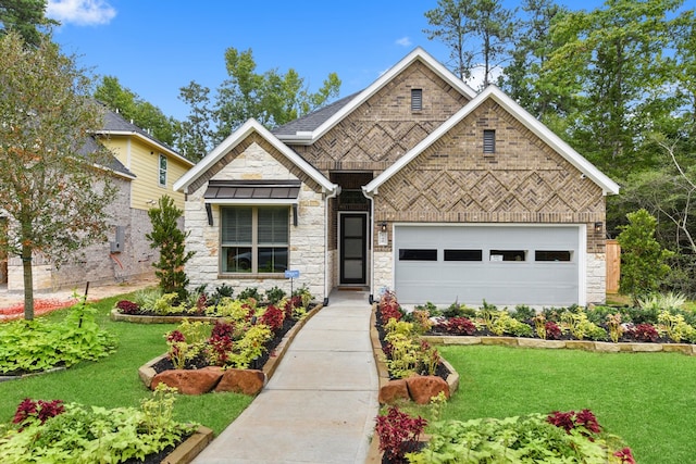 craftsman house with a garage and a front yard