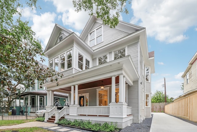 view of front of property featuring covered porch