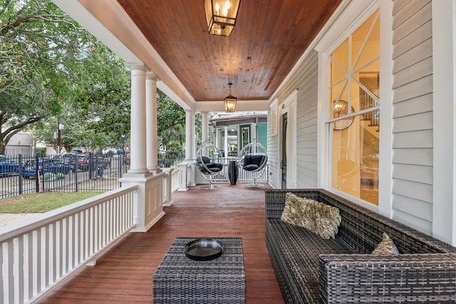 wooden deck featuring a porch