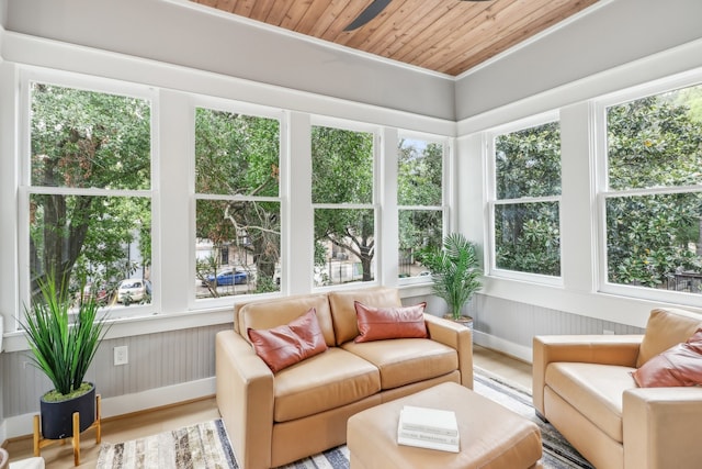 sunroom with a wealth of natural light and wooden ceiling