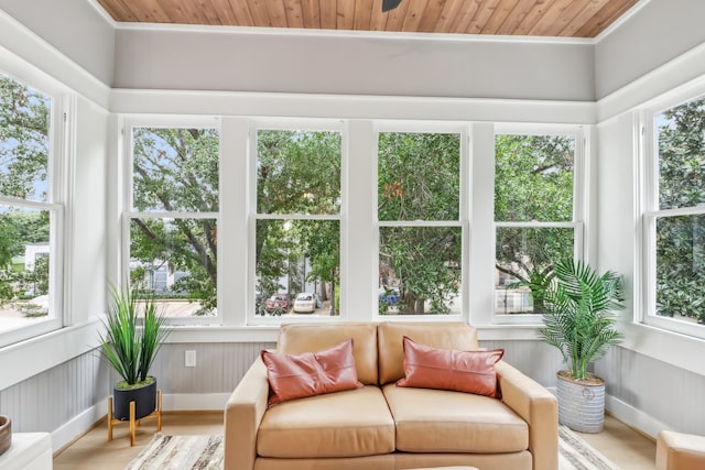 sunroom / solarium with plenty of natural light and wooden ceiling