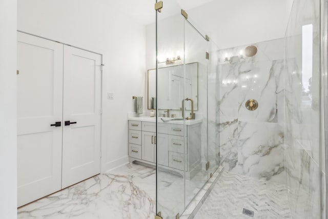 bathroom featuring vanity and an enclosed shower