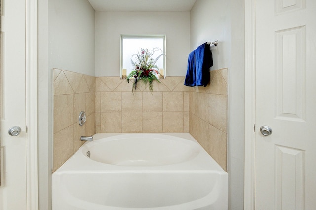 bathroom featuring a washtub