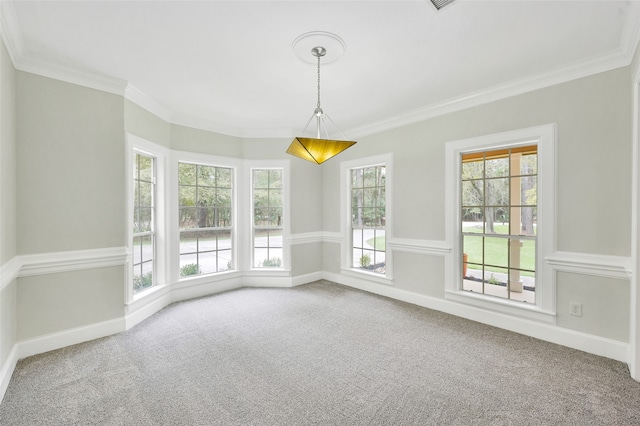 interior space with plenty of natural light and ornamental molding