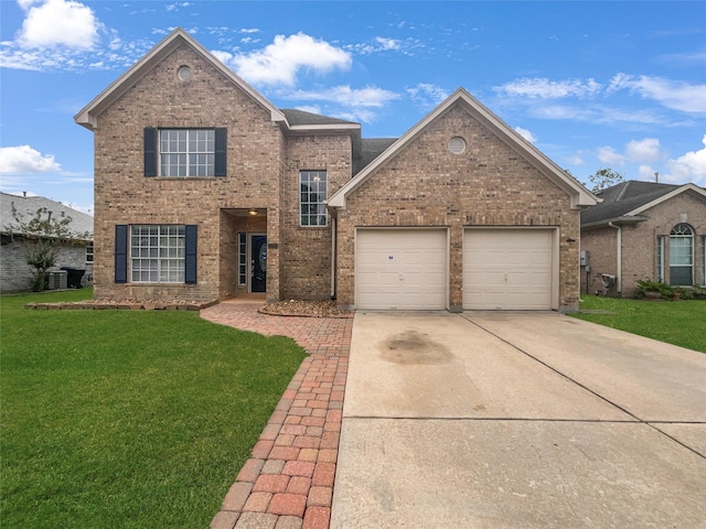 view of front property with a garage and a front lawn