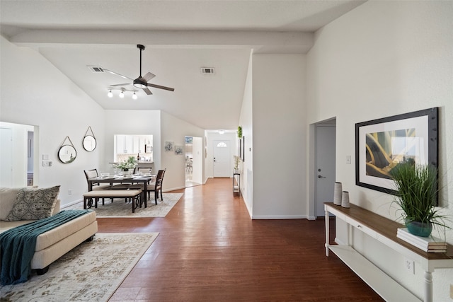 living room with dark hardwood / wood-style flooring, high vaulted ceiling, and ceiling fan