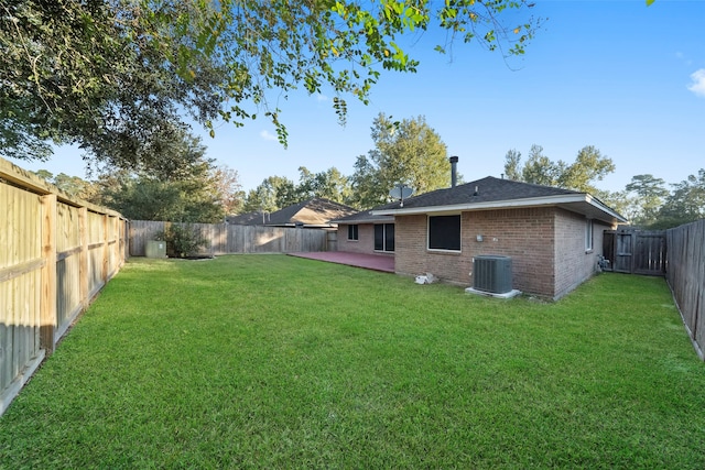 view of yard featuring a patio area and cooling unit