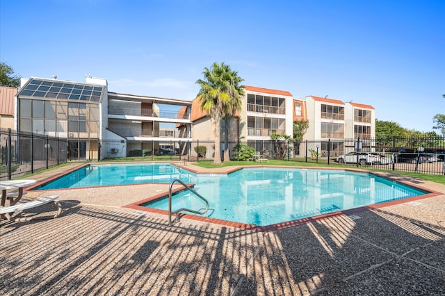 view of pool featuring a patio area