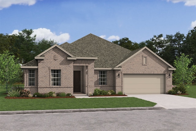 view of front of house with a front yard and a garage