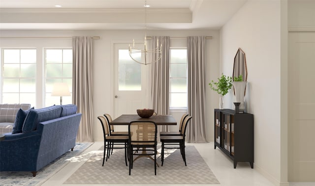 tiled dining area with a raised ceiling, ornamental molding, a healthy amount of sunlight, and an inviting chandelier