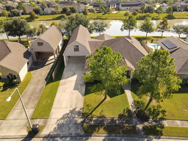 birds eye view of property featuring a water view