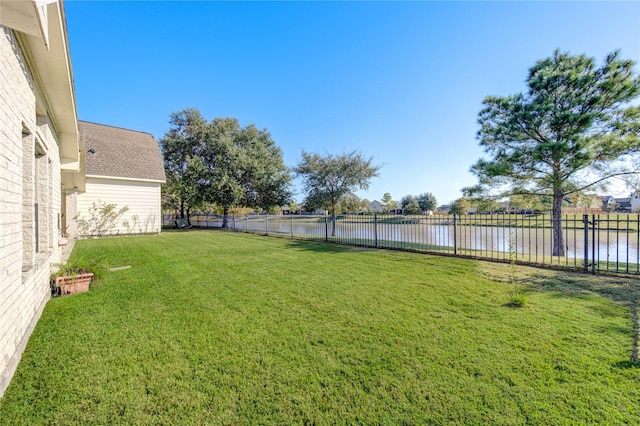 view of yard featuring a water view