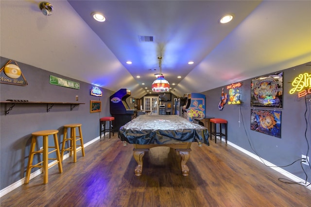 rec room featuring dark hardwood / wood-style floors, vaulted ceiling, and billiards