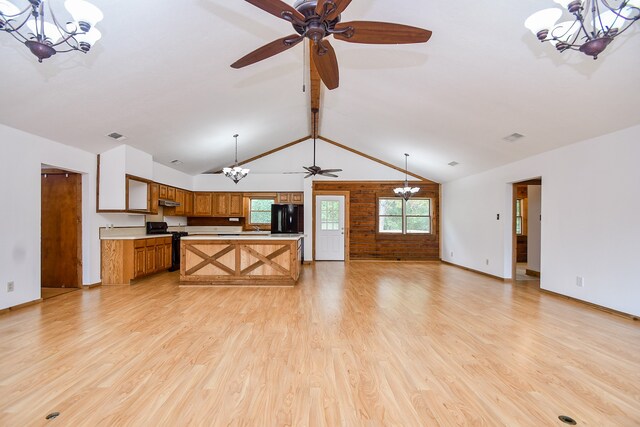 kitchen featuring hanging light fixtures, light hardwood / wood-style floors, ceiling fan, and black appliances