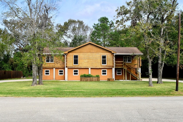 view of front of house with a front lawn