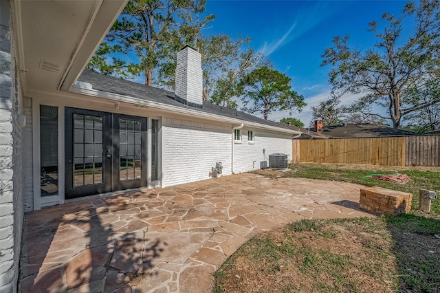 view of patio featuring central air condition unit and french doors