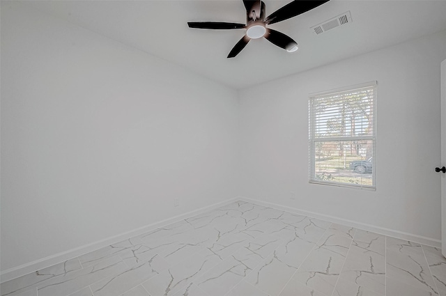 unfurnished room with ceiling fan