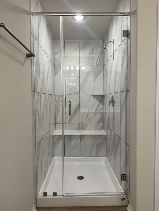 bathroom featuring walk in shower