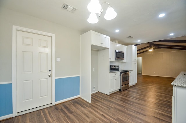 kitchen with pendant lighting, dark wood-type flooring, white cabinets, light stone counters, and stainless steel appliances