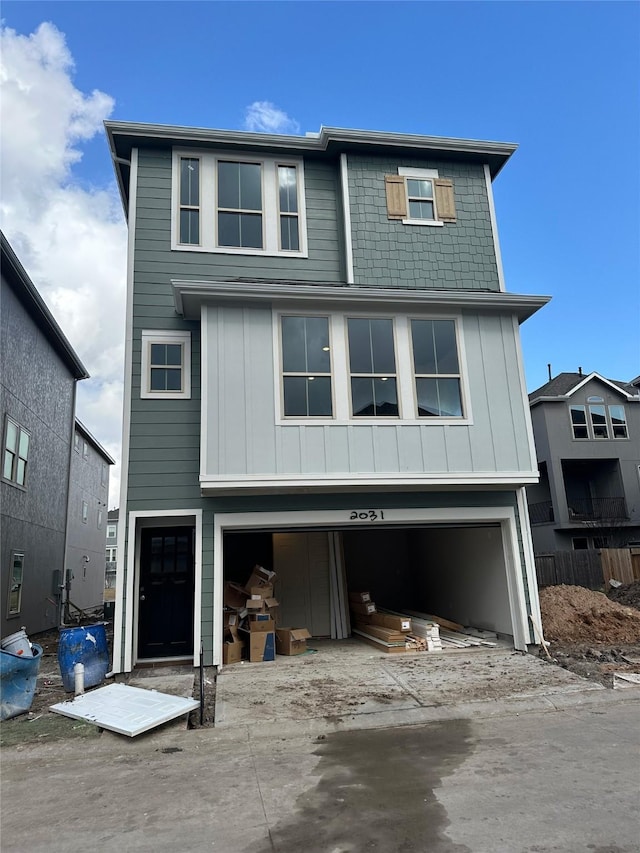 view of front of property with a garage