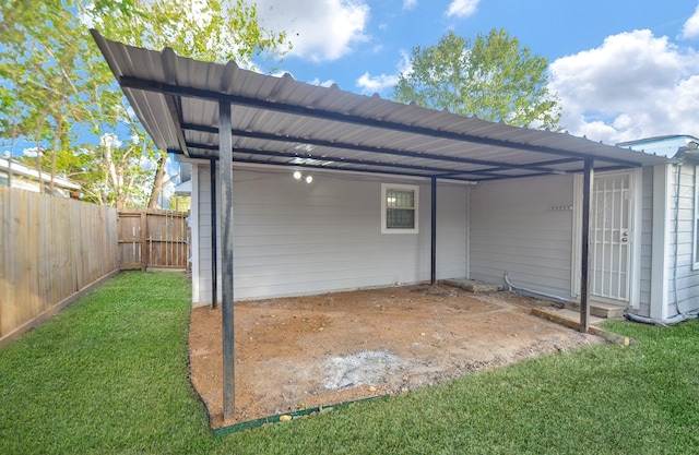 view of outdoor structure featuring a lawn