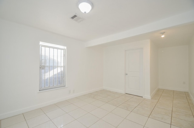 view of tiled spare room