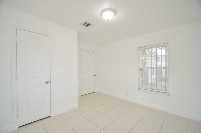 view of tiled spare room