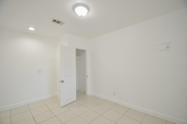 empty room featuring light tile patterned flooring