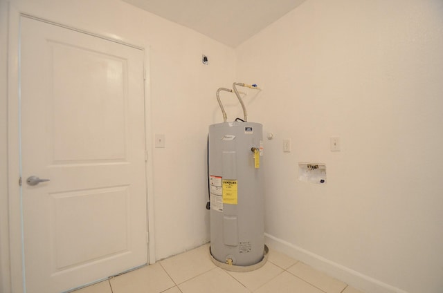 utility room featuring water heater