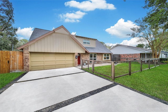 view of front facade with a front lawn and a garage