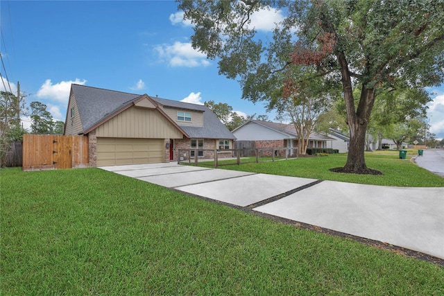 view of front facade with a front lawn and a garage