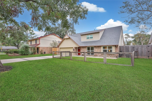 view of front facade featuring a garage and a front yard