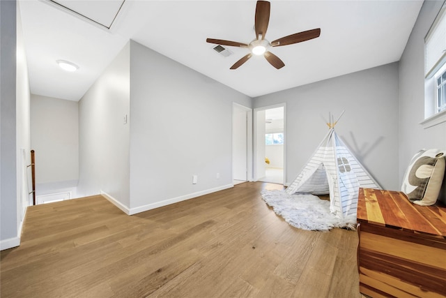 game room featuring hardwood / wood-style flooring and ceiling fan