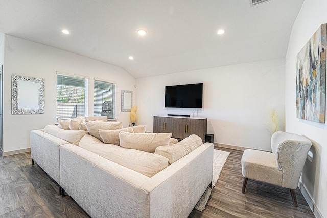 living room with lofted ceiling and dark wood-type flooring