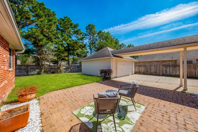 view of patio / terrace featuring a garage and an outdoor structure