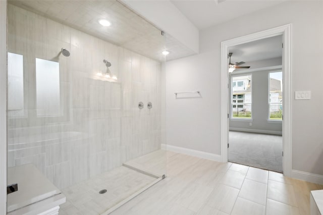 bathroom featuring tile patterned floors, ceiling fan, and tiled shower