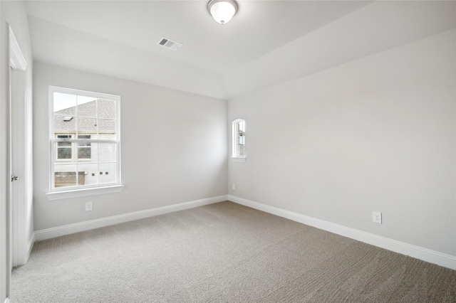 unfurnished room with carpet