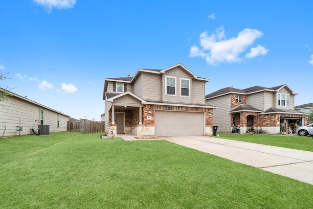 view of front of property featuring a garage, central air condition unit, and a front lawn