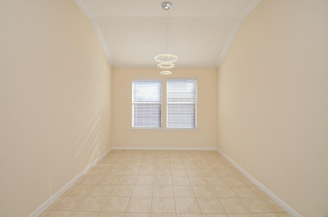 unfurnished room featuring vaulted ceiling, ornamental molding, and light tile patterned flooring